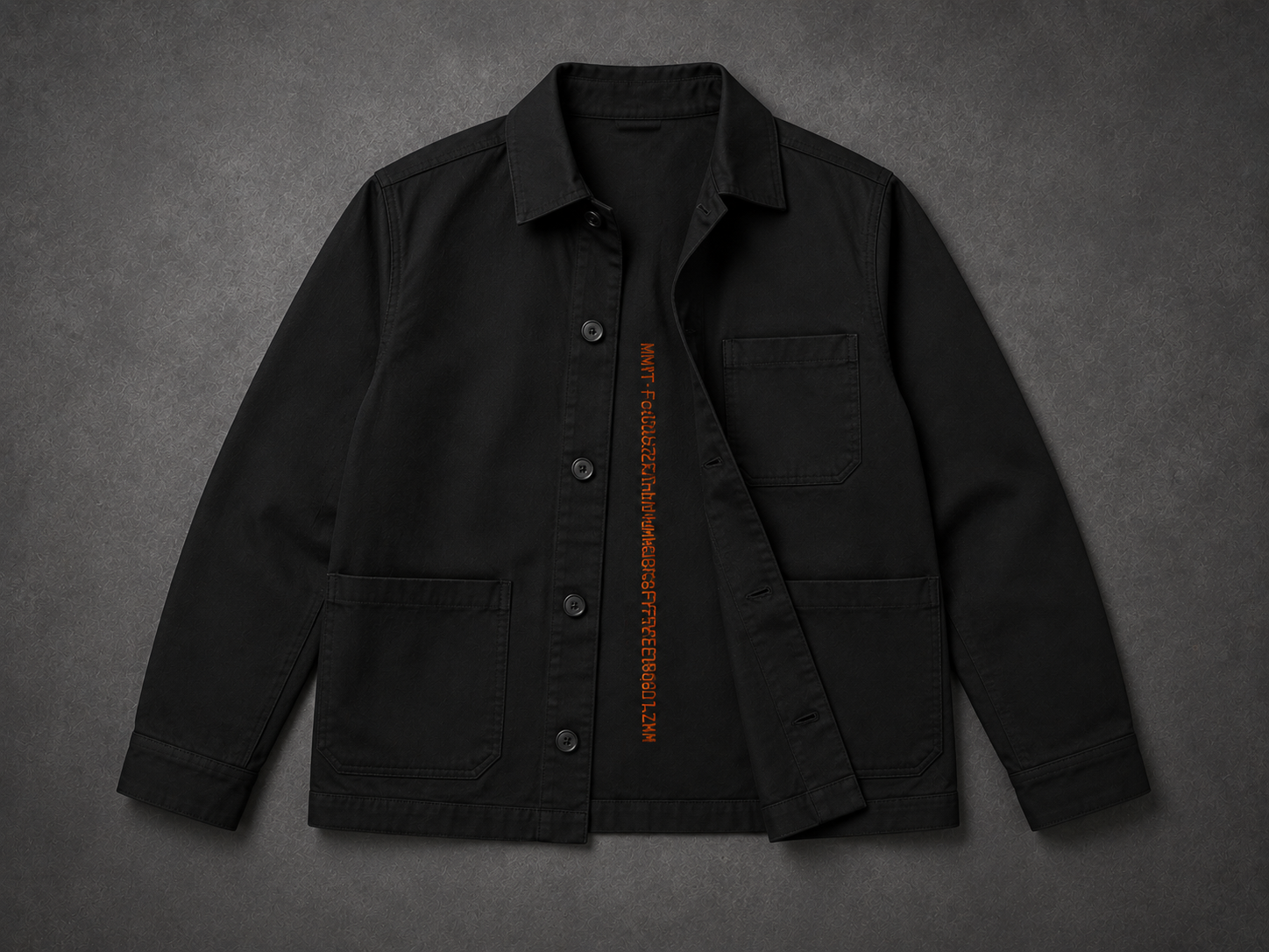 MONUMENT Chore Jacket 10 — Black / Orange Address, shown with its design-preview wallet-address artwork.